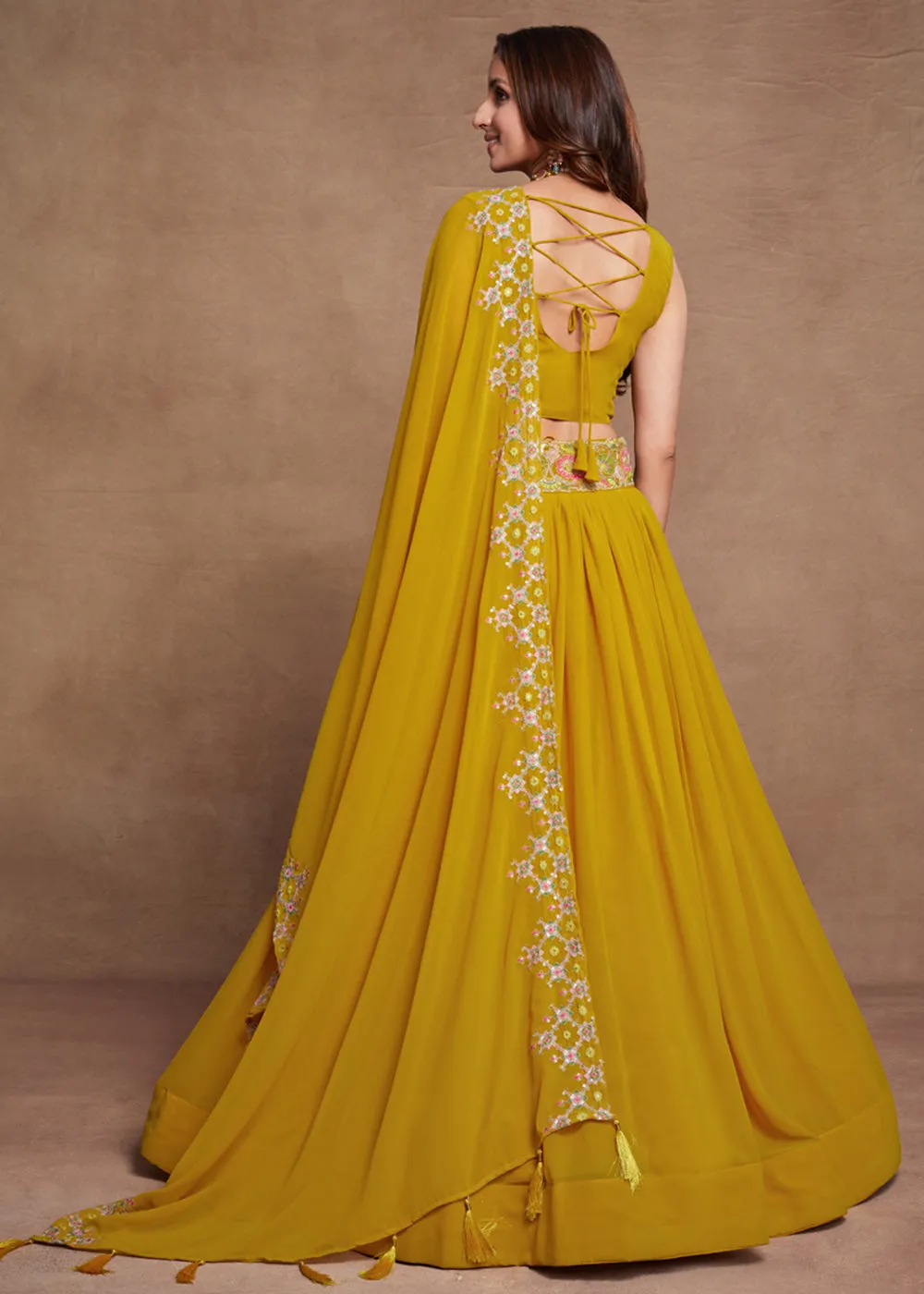 Blooming Georgette Yellow Embroidered Festive Lehenga Choli