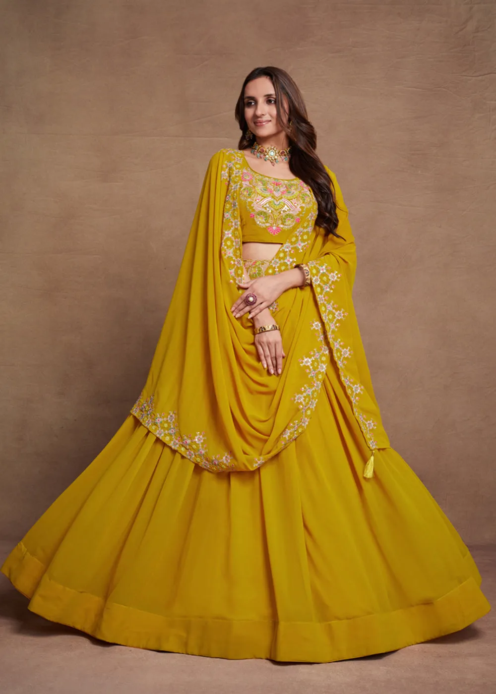 Blooming Georgette Yellow Embroidered Festive Lehenga Choli