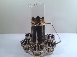 Fred Press Signed Mid-Century Black and 22-Karat Gold Diamonds Retro 8-Piece Cocktail Set (1 Pitcher, 1 Carrier, 6 Glasses)