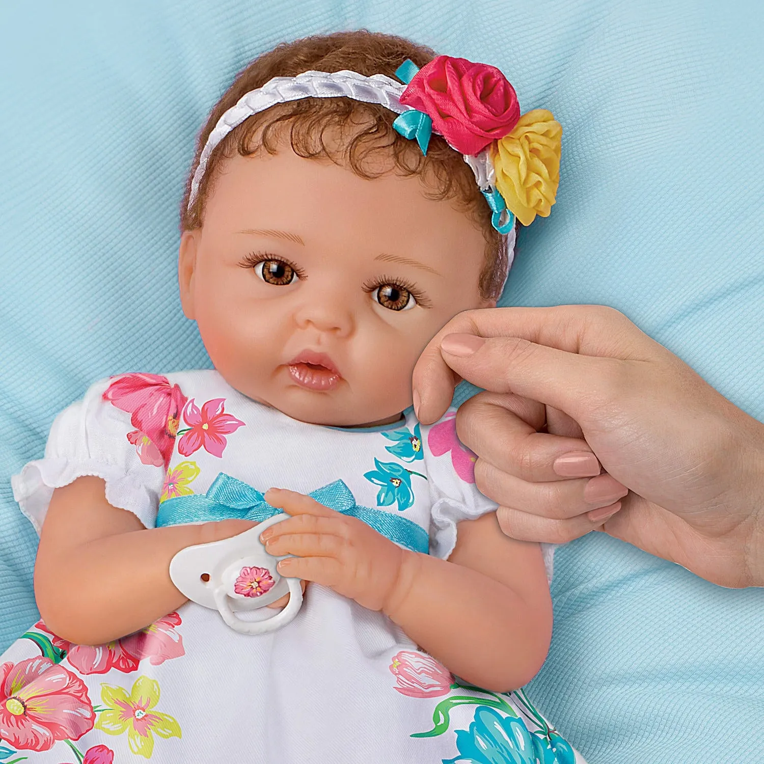 The Ashton-Drake Galleries Presley RealTouch Vinyl Lifelike Baby Doll by Cheryl Hill "Coos" At Your Touch 16-inches